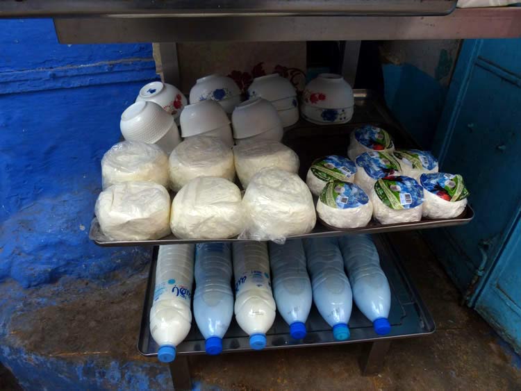 Cheeses and milk in the market.