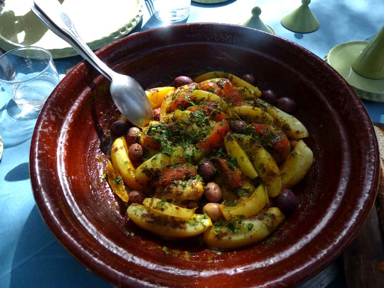 Bowl of cooked vegetables.
                          