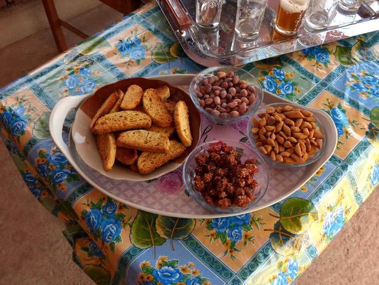 Bread, nuts, dates on a large platter.