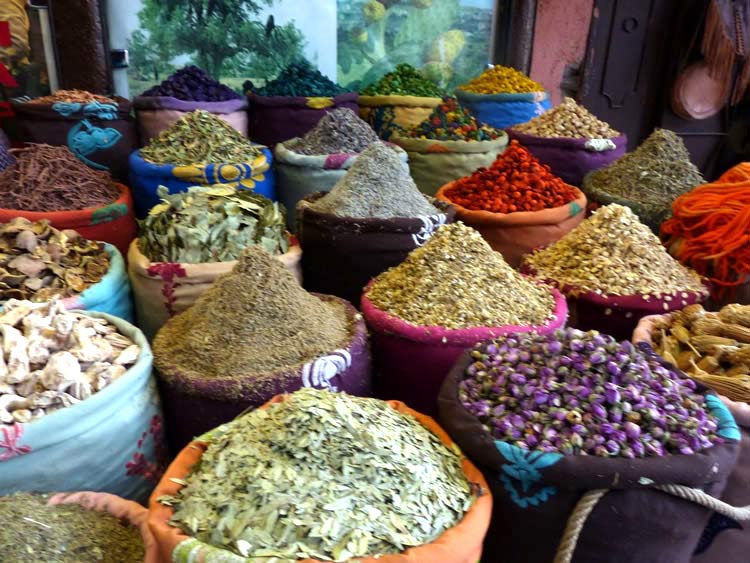 Colorful baskets of spices from Marrakech Market