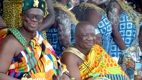 The smiling presiding Ashanti King with other royals watching the festival.