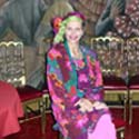 Nancy in a colorful dress on an Argentina visual arts trip