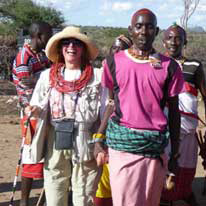 Nancy and colorful natives on a group walking tour of Southern Africa.