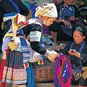 Image from the scrapbook of women creating colorful textiles