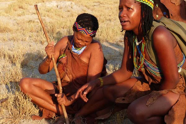 African tribal members in colorful dress.