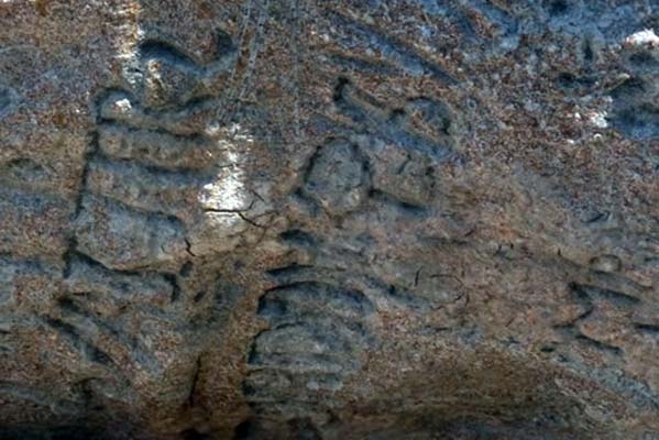 Grey engraved stone.