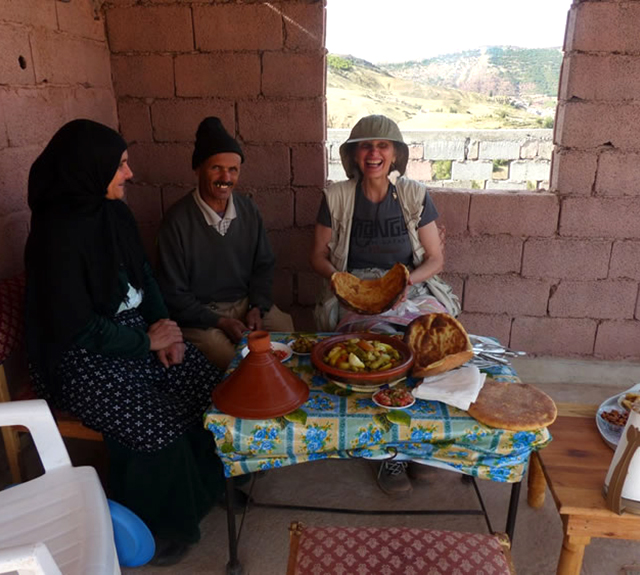 A delicious Moroccan dinner with flatbread and dinner baked in a clay pot.