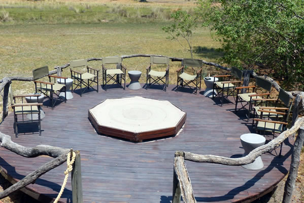 The group patio with a covered fire pit in the center