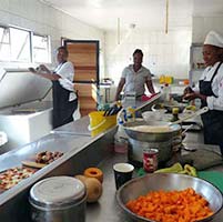 Camp cooks preparing food