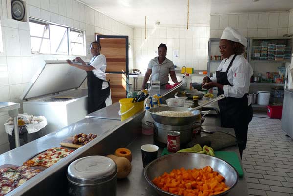 Safari Camp cooks preparing for the day's meals.