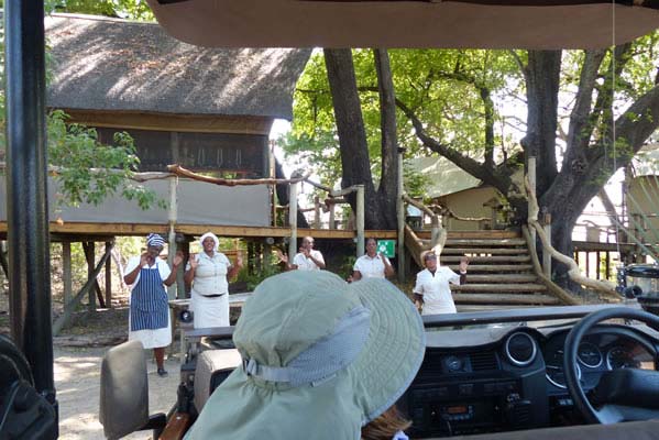 Staff welcoming travelers to their Safari Camp.