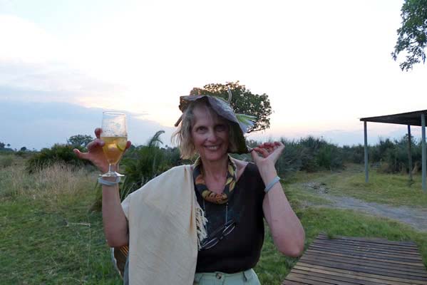 Tubu Tree Safari guest in the camp enjoying a beverage.