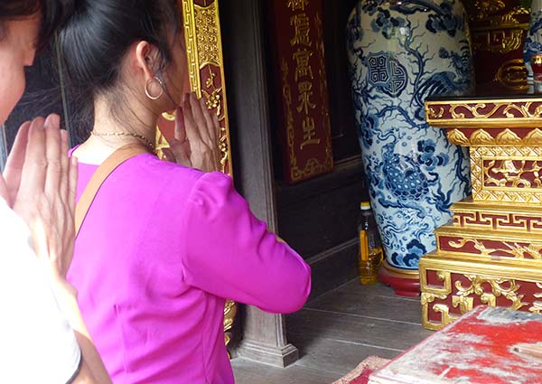 Visitors to the One Pillar Pagoda, Hanoi.