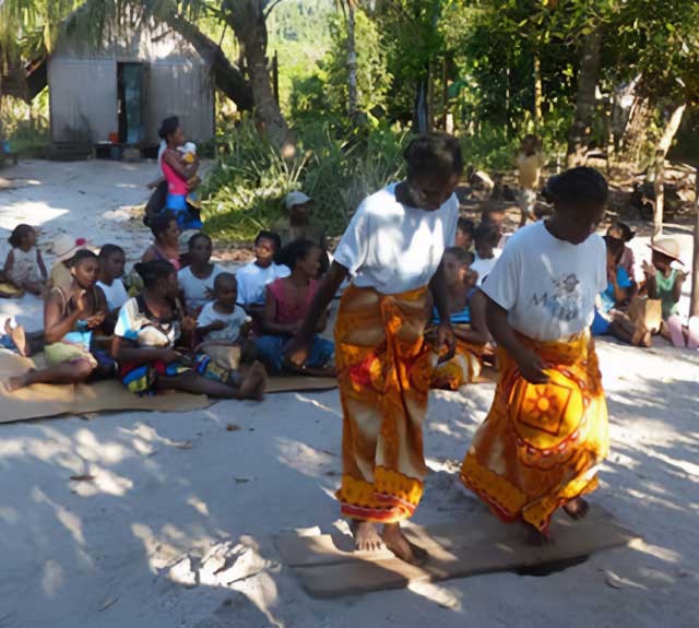 African Village dance with local women and children.